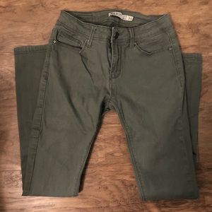 Green skinny jeans